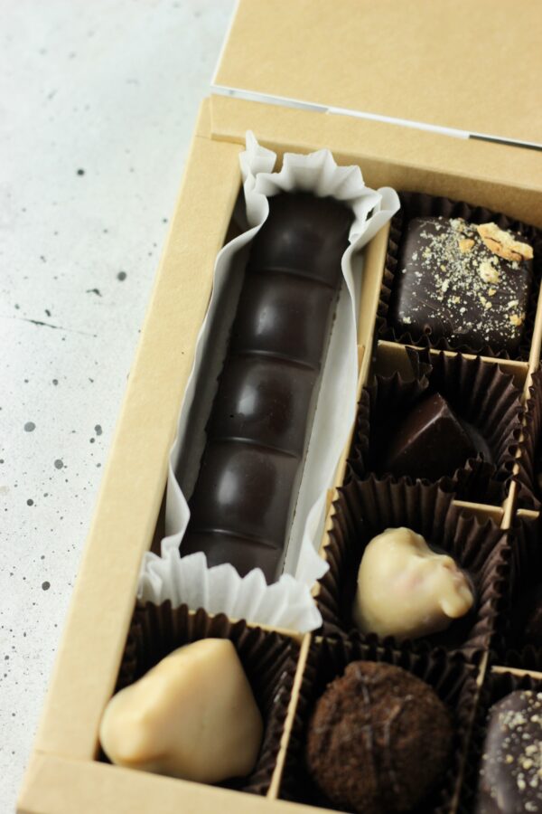 Box of 13 chocolate bonbons and 1 bar